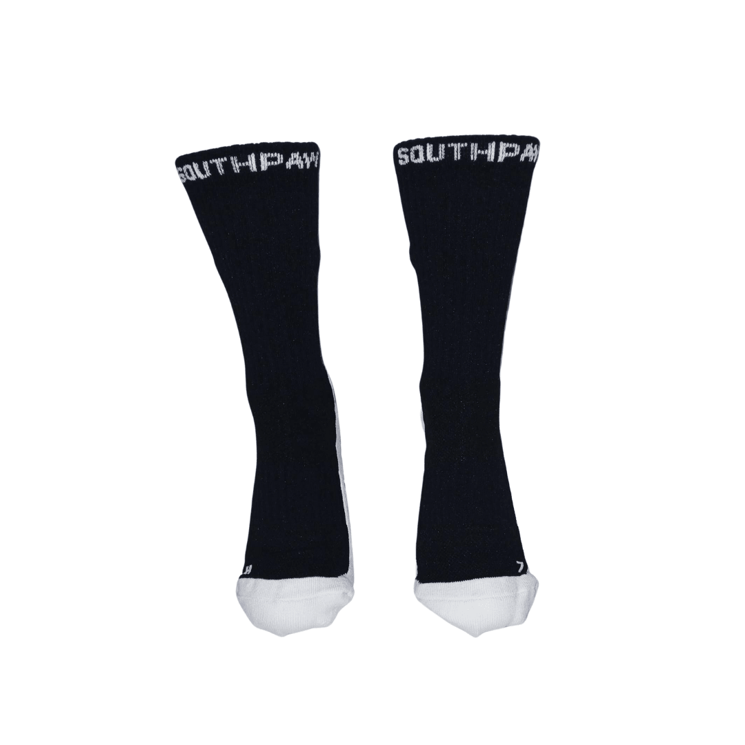 Front View Moisture Wicking Training boxing socks In Black With White Bottom, Black Support Grips, and southpaw logo on the back