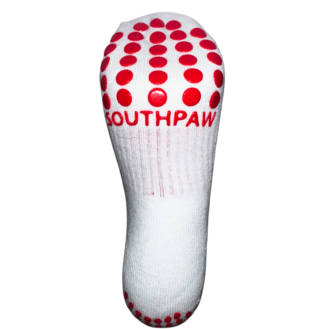 Bottom view of The worlds Best boxing socks by Southpaw official. White bottom with red branding and grips.