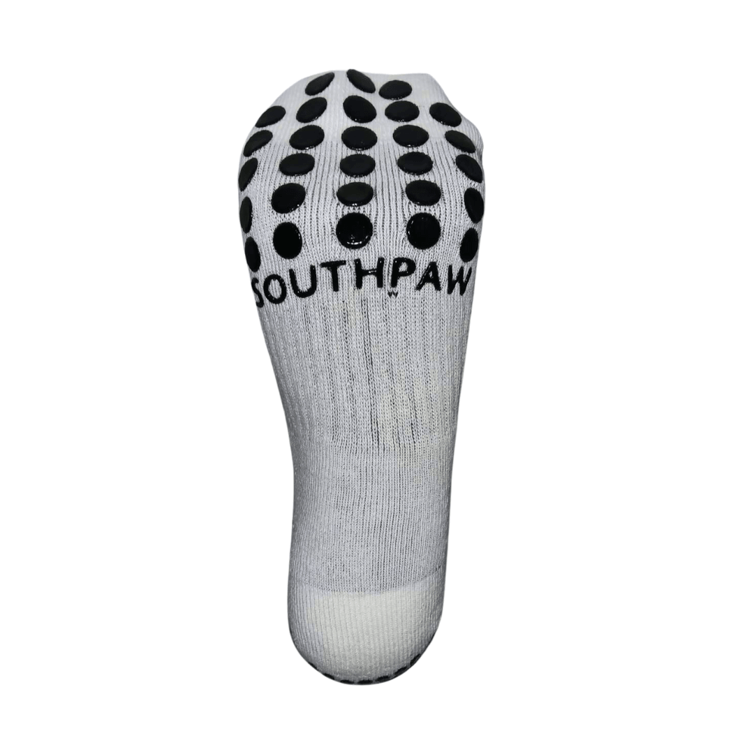 MoistBottom View Of Moisture Wicking Training boxing socks In Black With White Bottom, Black Support Grips, and southpaw logo on the back