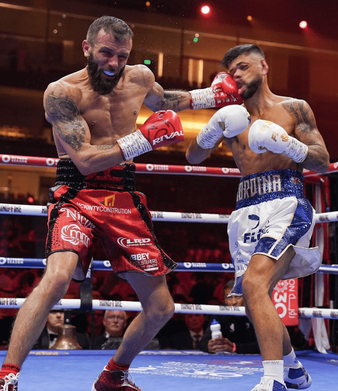 IBO & IBF World Champions Both In Southpaw Socks