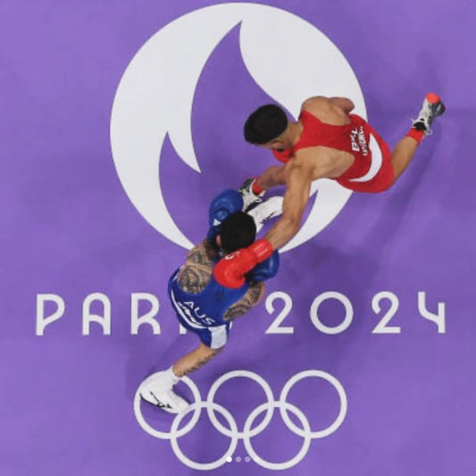 2 Olympian boxers wearing Southpaw Boxing Socks 