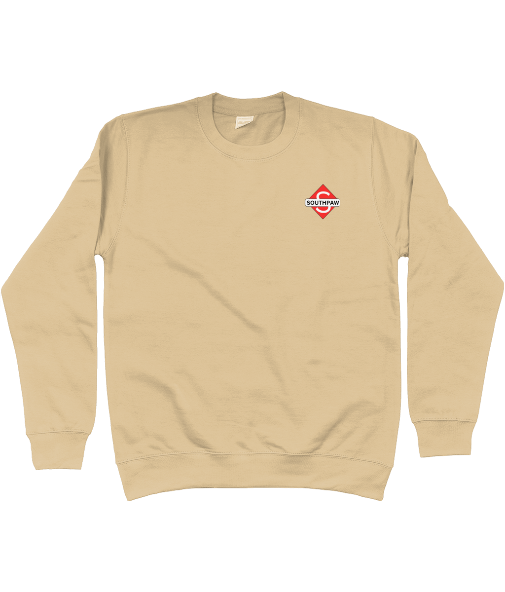 Front view | a desert sand Jumper with a small logo, this is lightweight and moisture wicking for youth athletes