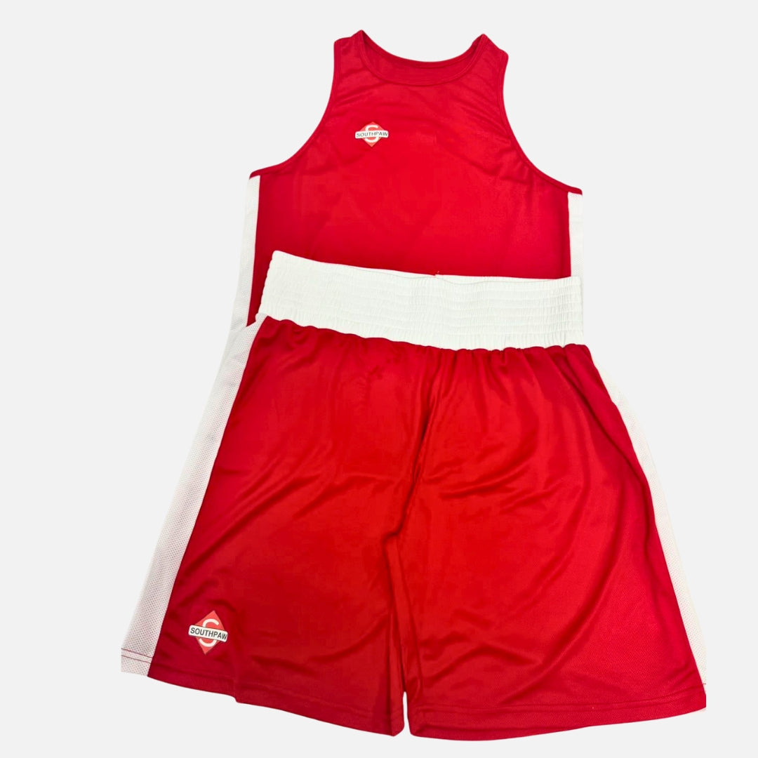 Front view of Southpaw red amateur boxing kit with vest and shorts for competition.