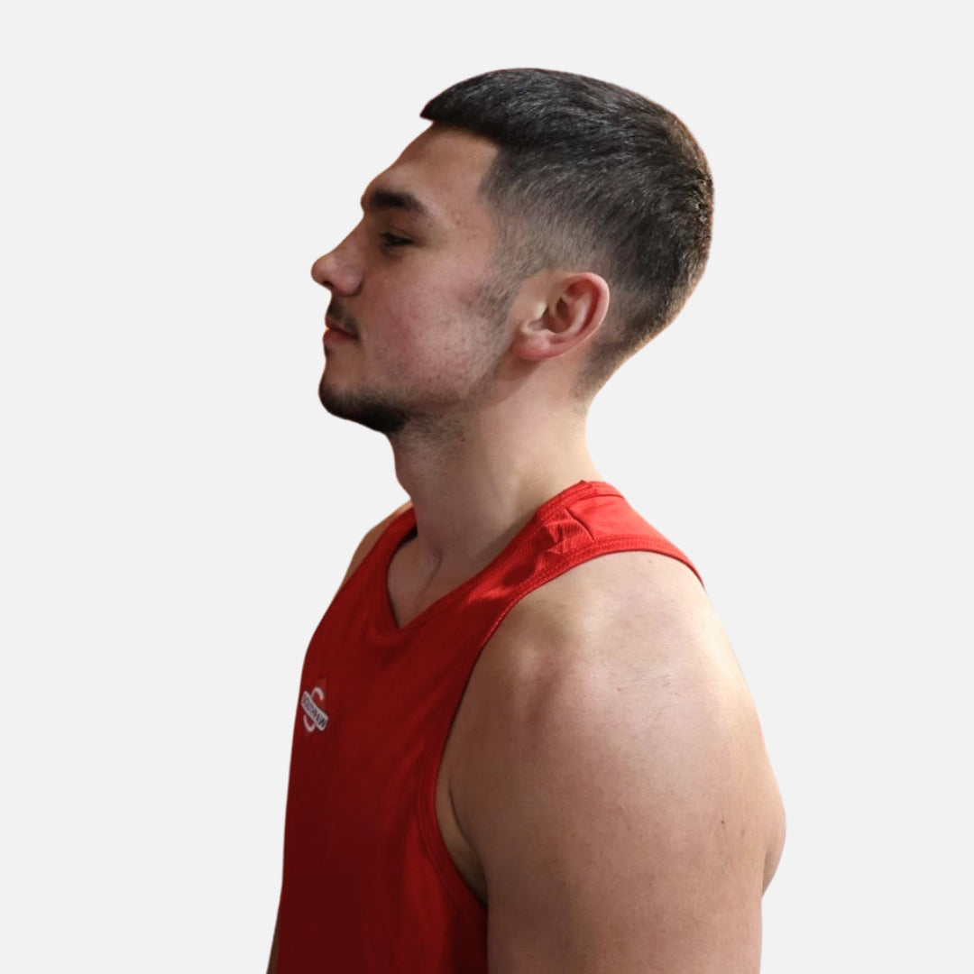 Side view of Southpaw red boxing kit highlighting lightweight breathable bird-eye mesh.